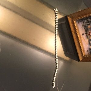 Classy- sterling silver tennis bracelet with beautiful 🤩 better than diamonds..